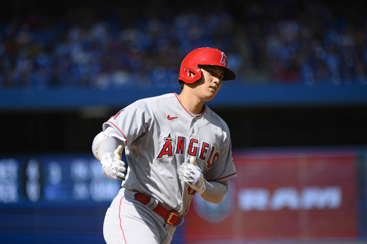 Los Angeles Angels designated hitter Shohei Ohtani (17) rounds the bases after hitting a two-run ho...