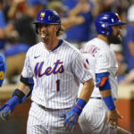 
              New York Mets' Jeff McNeil (1) celebrates after hitting a home run against the Cincinnati Reds during the fourth inning of a baseball game Tuesday, Aug. 9, 2022, in New York. (AP Photo/Frank Franklin II)
            