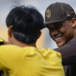 
              San Diego Padres right fielder Juan Soto, right, jokes with shortstop Ha-Seong Kim during batting practice for the Padres' baseball game against the Colorado Rockies on Wednesday, Aug. 3, 2022, in San Diego. (AP Photo/Gregory Bull)
            