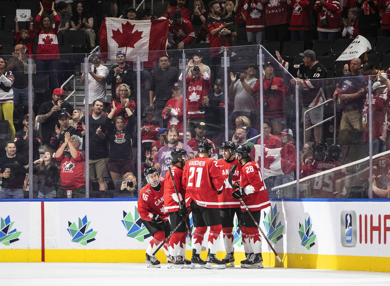 Canada celebrates a goal against Czechia during first-period IIHF world junior hockey championship ...