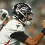 
              Atlanta Falcons quarterback Marcus Mariota (1) celebrates after wide receiver Olamide Zaccheaus (17) scores a touchdown during the first half of an NFL football game against the New York Jets, Monday, Aug. 22, 2022, in East Rutherford, N.J. (AP Photo/John Munson)
            