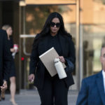 
              Vanessa Bryant, center, the widow of Kobe Bryant, leaves a federal courthouse in Los Angeles, Wednesday, Aug. 10, 2022. Kobe Bryant's widow is taking her lawsuit against the Los Angeles County sheriff's and fire departments to a federal jury, seeking compensation for photos deputies shared of the remains of the NBA star, his daughter and seven others killed in a helicopter crash in 2020. (AP Photo/Jae C. Hong)
            
