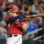 
              Washington Nationals first baseman Luke Voit watches his two-run homer during the fifth inning of a baseball game against the Oakland Athletics at Nationals Park, Wednesday, Aug. 31, 2022, in Washington. (AP Photo/Alex Brandon)
            