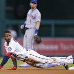 
              Washington Nationals' Victor Robles steals second base during the fourth inning of a baseball game against the New York Mets at Nationals Park, Tuesday, Aug. 2, 2022, in Washington. (AP Photo/Alex Brandon)
            