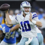 
              Dallas Cowboys quarterback Cooper Rush (10) throws during the first half of a preseason NFL football game against the Los Angeles Chargers Saturday, Aug. 20, 2022, in Inglewood, Calif. (AP Photo/Ashley Landis)
            