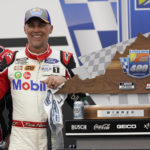 
              Kevin Harvick celebrates after winning a NASCAR Cup Series auto race at Richmond Raceway, Sunday, Aug. 14, 2022, in Richmond, Va. (AP Photo/Steve Helber)
            
