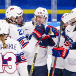 
              USA celebrate Hayley Scamurras 0-4 goal during the IIHF World Championship Women's ice hockey match between Japan and USA in Herning, Denmark, Thursday, Aug. 25, 2022. (Bo Amstrup/Ritzau Scanpix via AP)
            