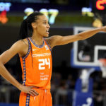 
              Connecticut Sun's DeWanna Bonner directs a teammate during the second half in Game 1 of a WNBA basketball semifinal playoff series against the Chicago Sky Sunday, Aug. 28, 2022, in Chicago. The Sun won 68-63. (AP Photo/Charles Rex Arbogast)
            