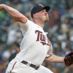 
              Minnesota Twins starting pitcher Dylan Bundy throws to a Toronto Blue Jays batter during the first inning of a baseball game Saturday, Aug. 6, 2022, in Minneapolis. (AP Photo/Bruce Kluckhohn)
            