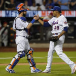 
              New York Mets relief pitcher Edwin Diaz (39) celebrates with catcher Tomas Nido (3) after striking out Philadelphia Phillies' Nick Castellanos to close the ninth inning of a baseball game, Saturday, Aug. 13, 2022, in New York. (AP Photo/John Minchillo)
            