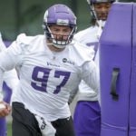 
              FILE -Minnesota Vikings defensive tackle Harrison Phillips takes part in drills at the NFL football team's practice facility in Eagan, Minn., Tuesday, May 17, 2022. The Minnesota Vikings are transitioning to a 3-4 defense and leaning on returner Dalvin Tomlinson and newcomer Harrison Phillips to anchor the interior of the line and serve as the primary run-stoppers for a unit trying to bounce back from a second straight substandard season.(AP Photo/Bruce Kluckhohn, File)
            