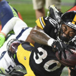 
              Pittsburgh Steelers running back Jaylen Warren (30) stretches for the end zone from out-of-bounds as Seattle Seahawks linebacker Vi Jones (50) defends during the second half of an NFL preseason football game Saturday, Aug. 13, 2022, in Pittsburgh. (AP Photo/Fred Vuich)
            