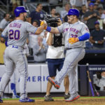 
              New York Mets' Daniel Vogelbach, right, celebrates his two-run home run scoring Pete Alonso in the seventh inning of a baseball game against the New York Yankees, Monday, Aug. 22, 2022, in New York. (AP Photo/Corey Sipkin)
            