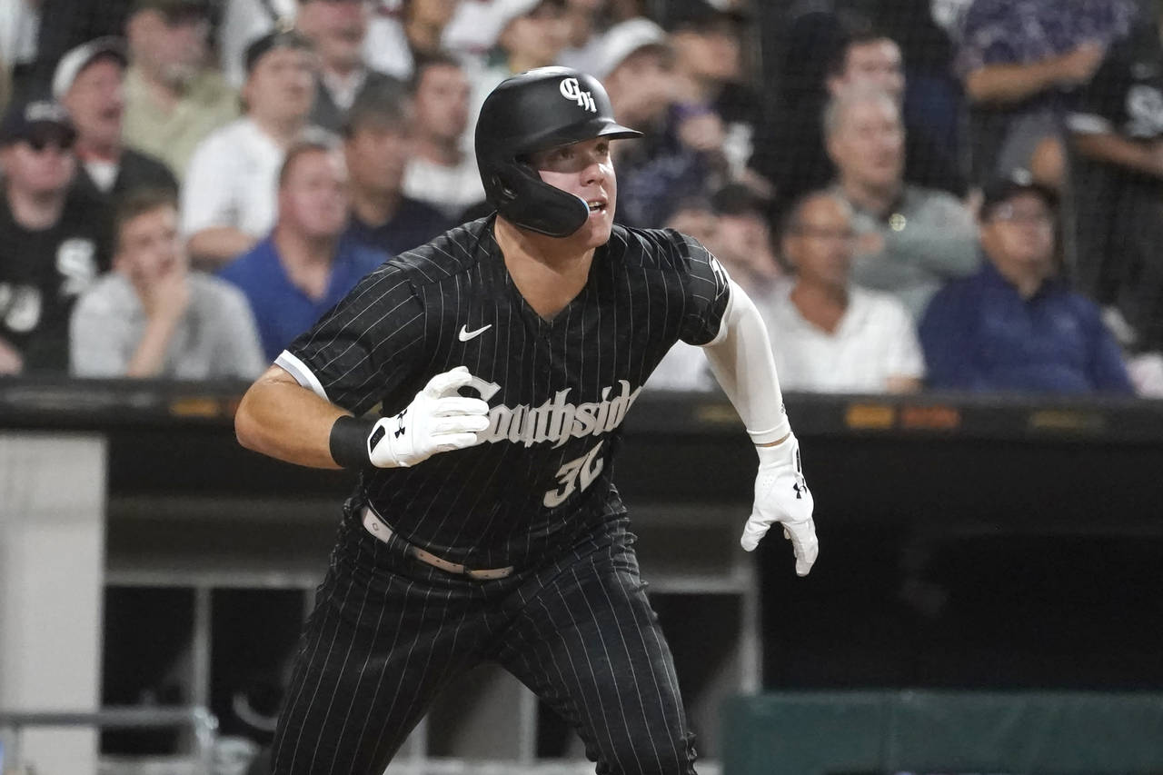 Chicago White Sox's Gavin Sheets watches his two-run double off Houston Astros starting pitcher Jus...