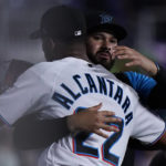 
              Miami Marlins starting pitcher Sandy Alcantara (22) is congratulated by Pablo Lopez after the Marlins beat the Cincinnati Reds 3-0 in a baseball game, Wednesday, Aug. 3, 2022, in Miami. (AP Photo/Wilfredo Lee)
            