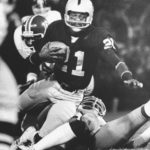 
              FILE - Oakland Raiders' Cliff Branch is brought down by Denver Broncos' Bob after picking up nine yards on a pass from quarterback Ken Stabler during the first period of an NFL football game on Dec. 3, 1978, at the Oakland Coliseum in Oakland, Calif. Branch was one of the best deep threats of his era to earn a spot in the Pro Football Hall of Fame. (AP Photo/Paul Sakuma, File)
            