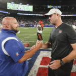 
              Cincinnati Bengals head coach Zac Taylor, right, shakes hands with New York Giants head coach Brian Daboll after an NFL football game Sunday, Aug. 21, 2022, in East Rutherford, N.J. The Giants won 25-22. (AP Photo/John Munson)
            