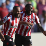
              Brentford's Bryan Mbeumo, left celebrates with Brentford's Josh Dasilva after scoring his sides 4th goal of the game during the English Premier League soccer match between Brentford and Manchester United at the Gtech Community Stadium in London, Saturday, Aug. 13, 2022. (AP Photo/Ian Walton)
            
