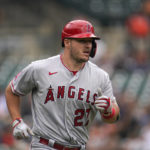 
              Los Angeles Angels' Mike Trout runs out a single against the Detroit Tigers in the seventh inning of a baseball game in Detroit, Sunday, Aug. 21, 2022. (AP Photo/Paul Sancya)
            