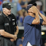 
              Boston Red Sox manager Alex Cora argues a call with home plate umpire Bill Welke during the seventh inning of a baseball game against the Kansas City Royals Thursday, Aug. 4, 2022, in Kansas City, Mo. (AP Photo/Charlie Riedel)
            