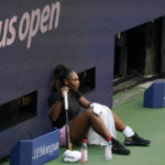
              Serena Williams rests while practicing at Arthur Ashe Stadium before the start of the U.S. Open tennis tournament in New York, Thursday, Aug. 25, 2022. (AP Photo/Seth Wenig)
            