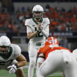 
              FILE - Baylor quarterback Blake Shapen (12) waits for the snap during the first half of the Big 12 Championship NCAA college football game against Oklahoma State in Arlington, Texas, Saturday, Dec. 4, 2021. The Big 12 is going into its 12th and final season as a 10-team conference. (AP Photo/Roger Steinman, File)
            