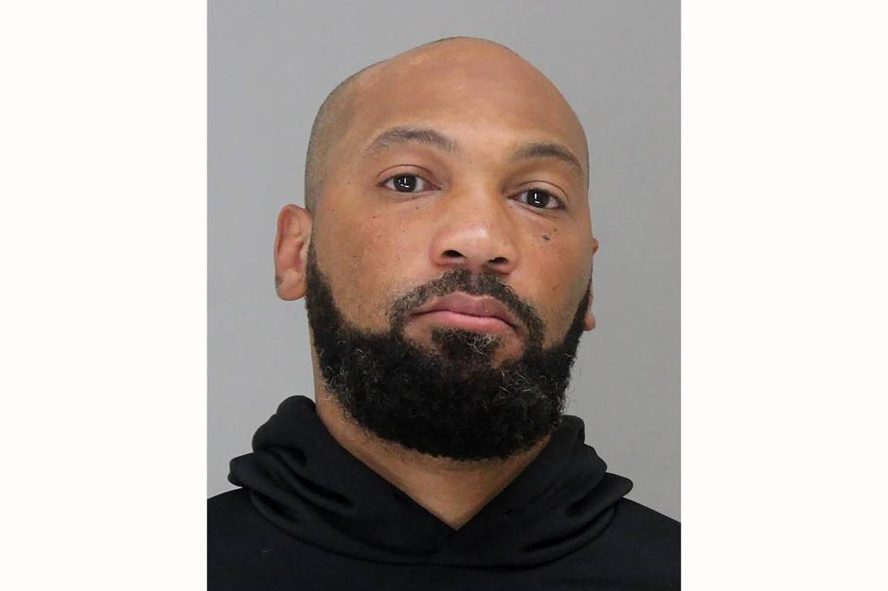 This booking photo released by the Dallas County Sheriff's Department, shows Yaqub Salik Talib on M...
