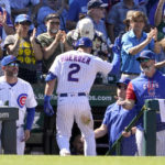 
              Chicago Cubs manager David Ross, right, greets Nico Hoerner after Horner's homer off Washington Nationals starting pitcher Josiah Gray during the seventh inning of a baseball game Wednesday, Aug. 10, 2022, in Chicago. (AP Photo/Charles Rex Arbogast)
            