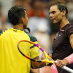 
              Rafael Nadal, right, of Spain, shakes hands with Rinky Hijikata, of Australia, during the first round of the US Open tennis championships, Tuesday, Aug. 30, 2022, in New York. (AP Photo/Frank Franklin II)
            