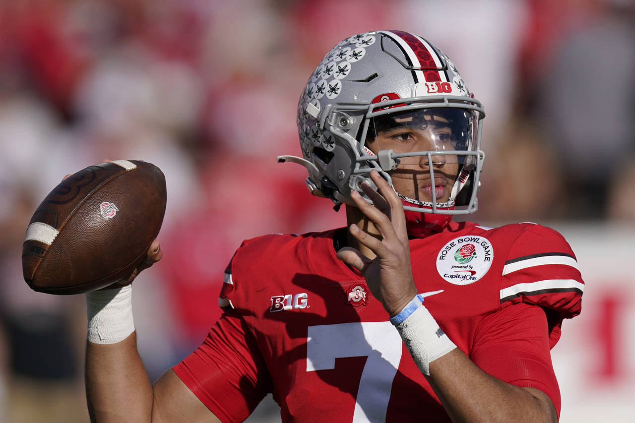 FILE - Ohio State quarterback C.J. Stroud throws during the first half in the Rose Bowl NCAA colleg...
