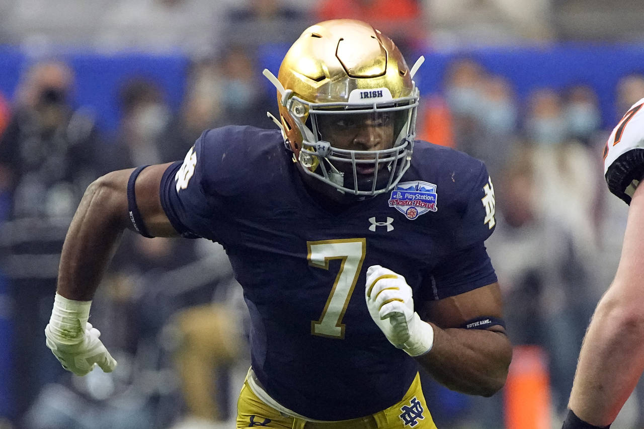 FILE - Notre Dame defensive lineman Isaiah Foskey (7) plays during the second half of the Fiesta Bo...
