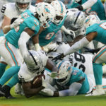 
              Las Vegas Raiders running back Zamir White (35) scores a touchdown during the first half of a NFL preseason football game against the Miami Dolphins, Saturday, Aug. 20, 2022, in Miami Gardens, Fla. (AP Photo/Lynne Sladky)
            