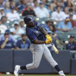 
              Tampa Bay Rays' Randy Arozarena hits a home run against the Milwaukee Brewers during the seventh inning of an a baseball game Wednesday, Aug. 10, 2022, in Milwaukee. (AP Photo/Jeffrey Phelps)
            
