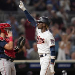 
              Minnesota Twins' Nick Gordon celebrates while crossing home plate after hitting a grand slam against the Boston Red Sox during the fifth inning of a baseball game Tuesday, Aug. 30, 2022, in Minneapolis. (AP Photo/Abbie Parr)
            