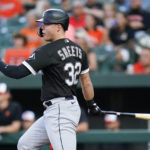 
              Chicago White Sox's Gavin Sheets connects for a two-run single against the Baltimore Orioles during the first inning of a baseball game, Wednesday, Aug. 24, 2022, in Baltimore. White Sox's Andrew Vaughn and Luis Robert scored on the single. (AP Photo/Julio Cortez)
            