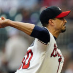 
              Atlanta Braves starting pitcher Charlie Morton works against the New York Mets during the first inning of a baseball game Tuesday, Aug. 16, 2022, in Atlanta. (AP Photo/John Bazemore)
            