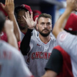 
              Cincinnati Reds' Albert Almora Jr. is congratulated by teammates after he scored on a single by Jonathan India during the seventh inning of a baseball game against the Miami Marlins, Monday, Aug. 1, 2022, in Miami. (AP Photo/Wilfredo Lee)
            