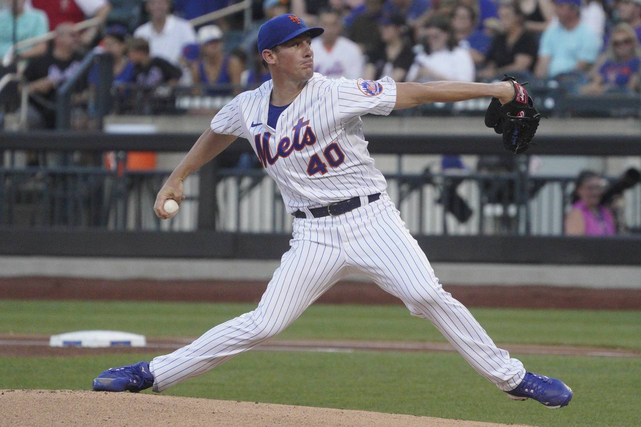 New York Mets' Chris Bassitt pitches during the first inning of a baseball game against the Cincinn...