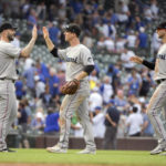 
              Miami Marlins celebrate their 3-0 win over the Chicago Cubs, Sunday, Aug. 7, 2022, at Wrigley Field in Chicago. (AP Photo/Mark Black)
            
