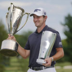 
              Patrick Cantlay celebrates after winning the BMW Championship golf tournament at Wilmington Country Club, Sunday, Aug. 21, 2022, in Wilmington, Del. (AP Photo/Julio Cortez)
            