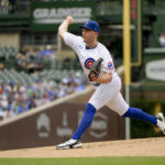 
              Chicago Cubs starting pitcher Adrian Sampson throws against the Miami Marlins during the first inning of a baseball game, Sunday, Aug. 7, 2022, at Wrigley Field in Chicago. (AP Photo/Mark Black)
            