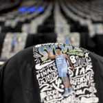 
              T-shirts in honor of Minnesota Lynx's Sylvia Fowles are draped on the seats before the team's WNBA basketball game against the Seattle Storm on Friday, Aug. 12, 2022, in Minneapolis. (Elizabeth Flores/Star Tribune via AP)
            
