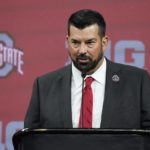 
              FILE - Ohio State head coach Ryan Day talks to reporters during an NCAA college football news conference at the Big Ten Conference media days, at Lucas Oil Stadium, Wednesday, July 27, 2022, in Indianapolis. Pay-for-play situations or improper inducements are still banned, but there is nothing stopping colleges from letting recruits know how athletes on campus are already profiting through NIL deals and how much support is available to them if they're interested. For instance, Ohio State has a Twitter account in which it boasted this summer that it had surpassed 1,000 disclosed NIL deals for its athletes. (AP Photo/Darron Cummings, File)
            