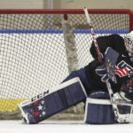 
              United States' goalie Maddie Rooney (35) makes a save during practice at the LECOM Harborcenter rink in Buffalo, N.Y., Tuesday, Aug. 16, 2022. (AP Photo/Joshua Bessex)
            