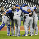 
              Kansas City Royals celebrate the team's 9-7 win over the Chicago White Sox in a baseball game Tuesday, Aug. 30, 2022, in Chicago. (AP Photo/Charles Rex Arbogast)
            
