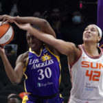 
              Los Angeles Sparks forward Nneka Ogwumike, left, grabs rebound away from Connecticut Sun center Brionna Jones during the first half of a WNBA basketball game Thursday, Aug. 11, 2022, in Los Angeles. (AP Photo/Mark J. Terrill)
            