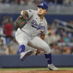 
              Los Angeles Dodgers starting pitcher Julio Urias (7) aims a pitch in the first inning of a baseball game against the Miami Marlins, Sunday, Aug. 28, 2022, in Miami. The Dodgers defeated the Marlins 8-1. (AP Photo/Marta Lavandier)
            