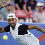 
              Nick Kyrgios, of Australia, prepares to hit a forehand to Marcos Giron, of the United States, at the Citi Open tennis tournament in Washington, Tuesday, Aug. 2, 2022. (AP Photo/Carolyn Kaster)
            