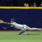
              Kansas City Royals left fielder MJ Melendez makes a diving catch on a fly out by Tampa Bay Rays' Francisco Mejia during the 10th inning of a baseball game Friday, Aug. 19, 2022, in St. Petersburg, Fla. (AP Photo/Chris O'Meara)
            