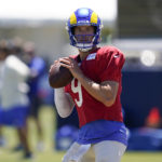 
              Los Angeles Rams quarterback Matthew Stafford (9) participates in drills at the NFL football team's practice facility in Irvine, Calif., Saturday, Aug. 6, 2022. (AP Photo/Ashley Landis)
            